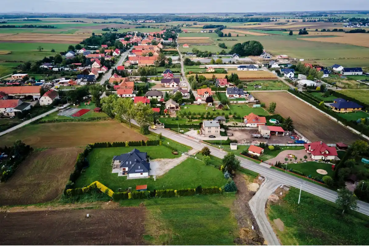 Aerial view of homes and surrounding farmland; illustrative photo